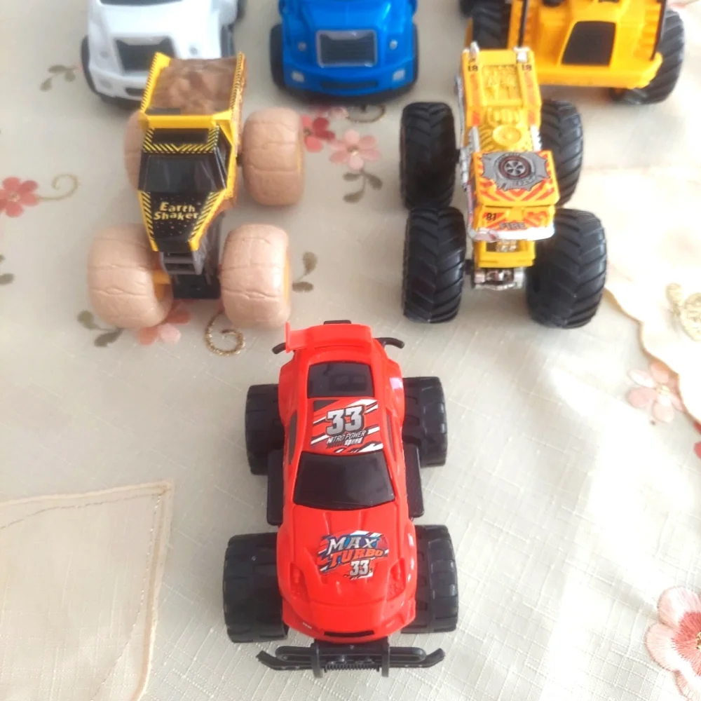Toys miscellaneous vehicles Cars Trucks Big Wheels 10 each